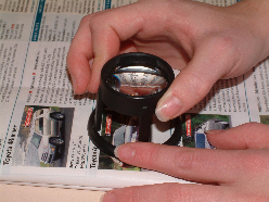 Stand magnifier for low vision reading